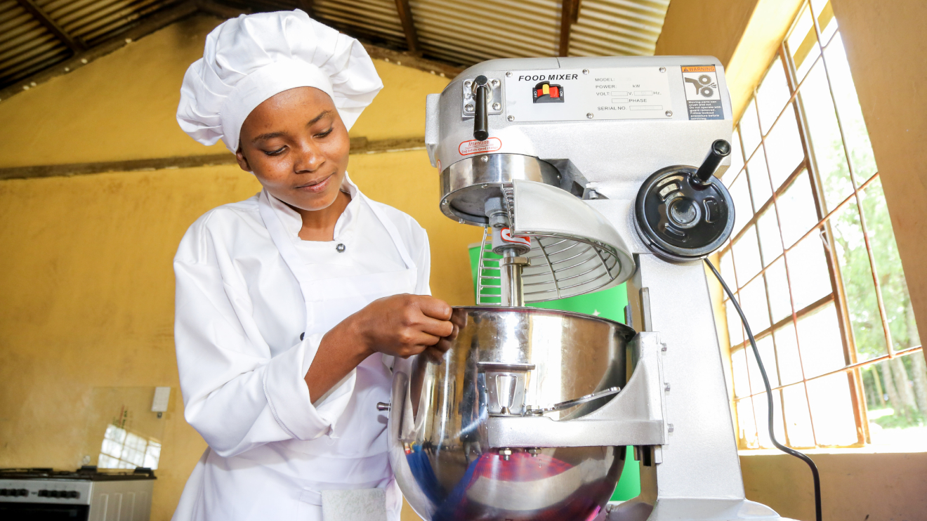 Student at Narok Vocational and Training Centre usinga new bakery equipment. PHOTO/COURTESY